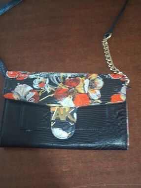 Anne Klein Black Crossbody with Orange Floral Accent